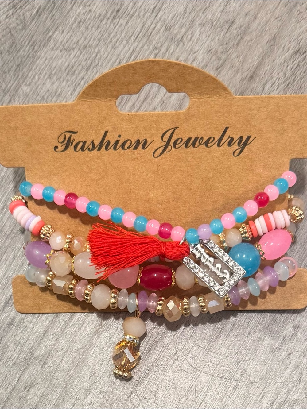 Fashion Jewelry Pink, Blue & Red Beaded Bracelet Stack with Red Tassel